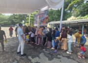 Sat Intelkam Polres Lampung Utara Pantau Operasi Pasar Minyak Goreng Minyak Kita di Pasar Sentral Kotabumi