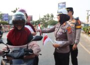 Polres Lampung Utara Bagikan 775 Bendera Merah Putih Sambut HUT ke-81 RI